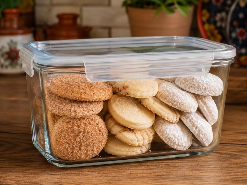 Mexican cookies stored in an airtight container to stay fresh