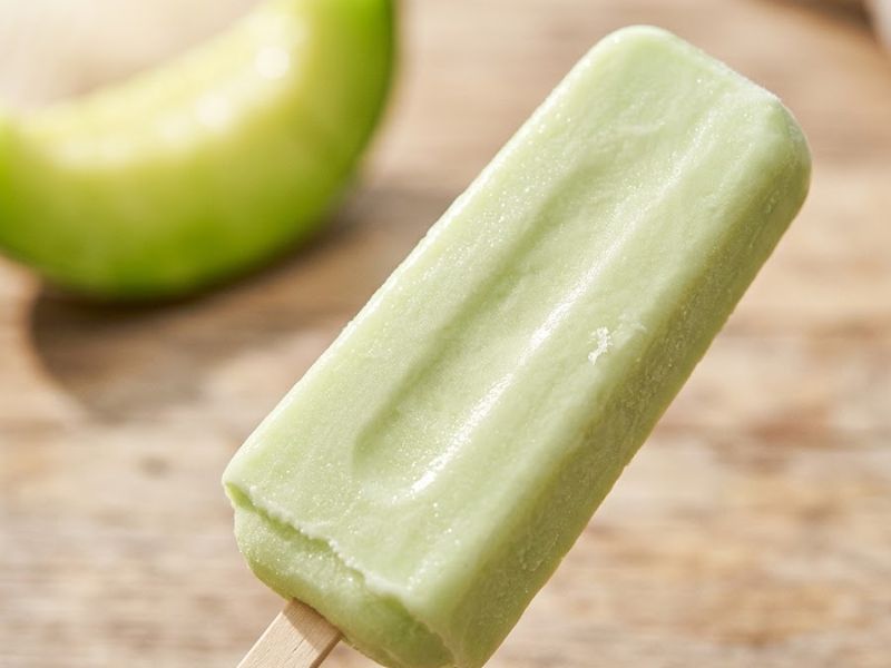 Close-up of Melona Ice Cream bar with creamy honeydew texture