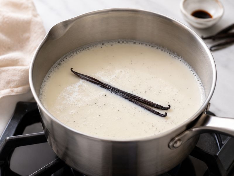 warming milk cream and vanilla for ice cream