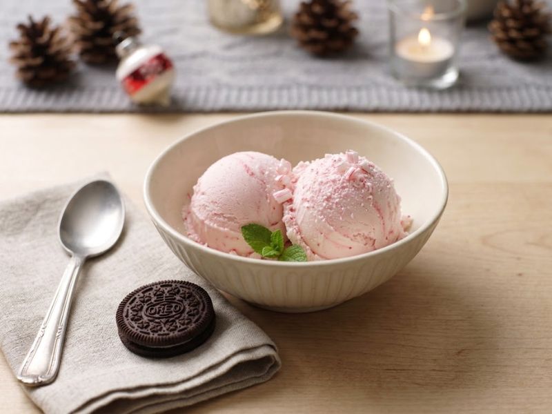 Candy Cane Ice Cream served with crushed peppermint and chocolate cookie