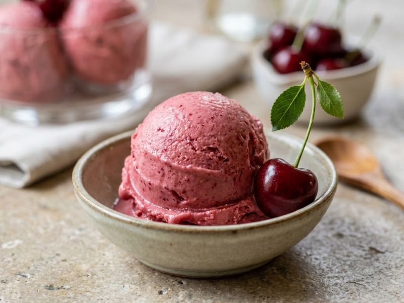 Creamy scoop of homemade cherry gelato