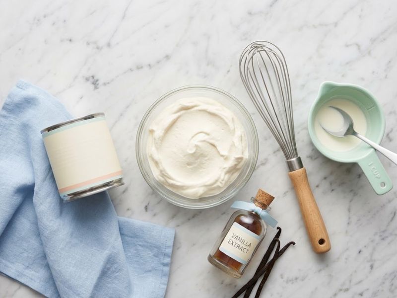 Ingredients for ice cream without an ice cream maker: cream, condensed milk, and vanilla