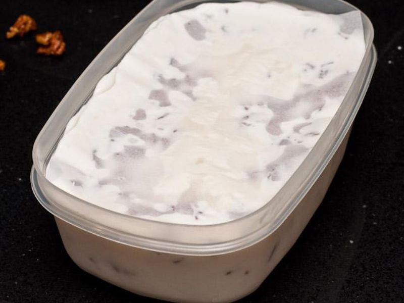 - Maple bacon crunch ice cream stored in an airtight freezer-safe container
